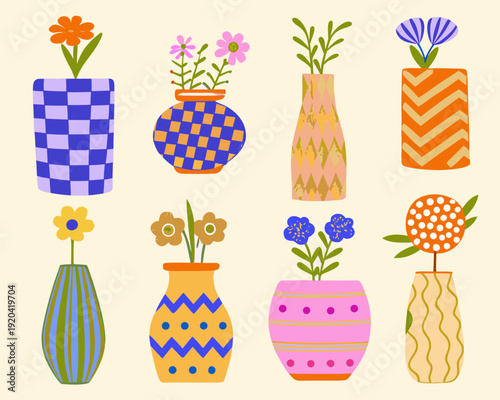 Colorful vases with various flowers arranged in a delightful patterned row