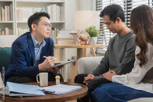 couples therapy session, a marriage counselor consults with a young couple for family therapy, offering relationship counseling, marriage help, family support, anxiety therapy, depression support