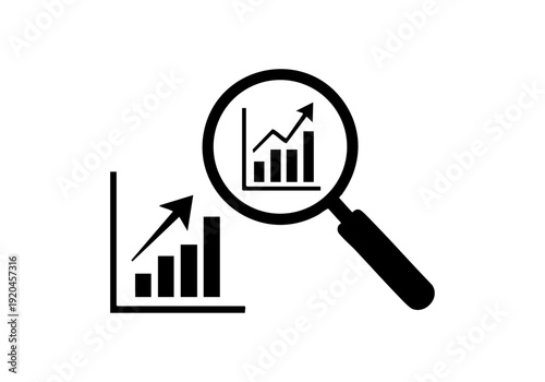 Magnifying glass analyzing growing business chart graph