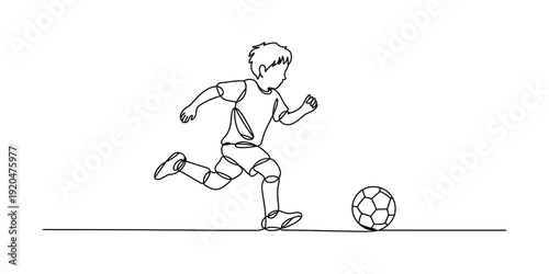 A black and white line drawing of a young boy running and kicking a soccer ball on a field. Vector, illustration