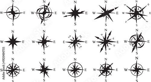Collection of various black compass rose navigation symbols