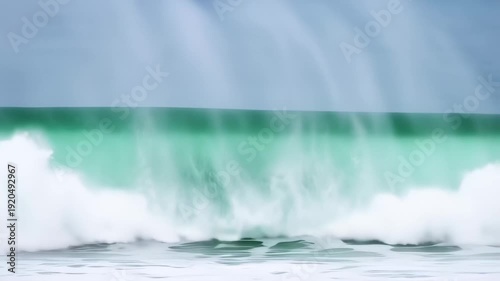 Powerful Ocean Wave Crashing with White Foam and Deep Green Water.