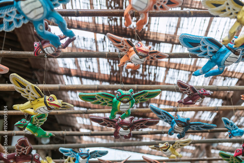 Tableau sur toile Colorful frogs with wings on ceiling at Nyoirinji Temple, Ogori