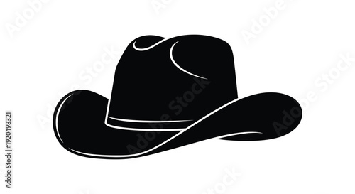 A striking black silhouette of a classic cowboy hat rests against a plain white background creating a bold image silhouette