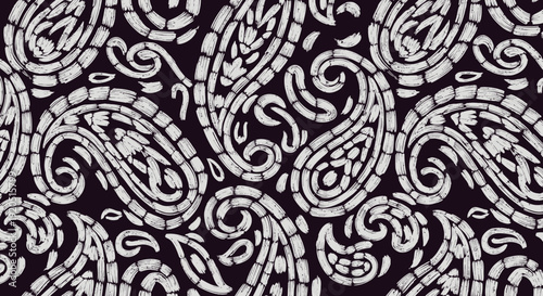 Intricate black and white paisley pattern with ornate swirls and arabesque flourishes.