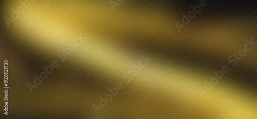 Foto Abstract golden metallic surface with a diagonal light reflection, creating a brushed metal texture in varying shades of gold and dark brown