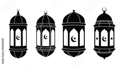 Four ornate ramadan lanterns displayed in a dark dramatic silhouette