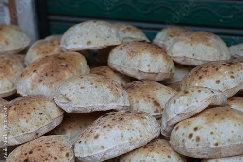 Closeup of Freshly baked Eish Baladi (traditional Egyptian flatbread)