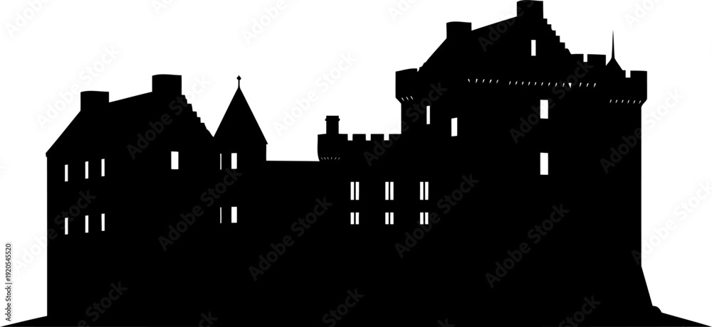 Fototapeta premium Historic castle complex silhouette with multiple turrets and battlements