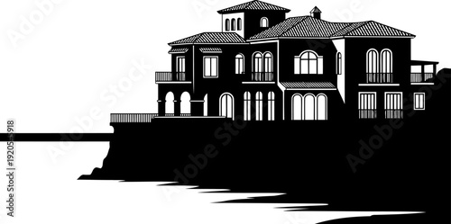 Luxury coastal villa silhouette perched on a cliffside