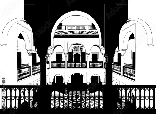 Moroccan riad courtyard interior featuring traditional arches and balconies in black and white