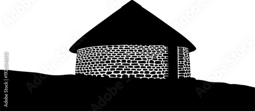 Primitive stone dwelling sitting on a slight hill