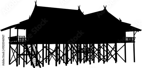 Traditional thai house silhouette on stilts complex