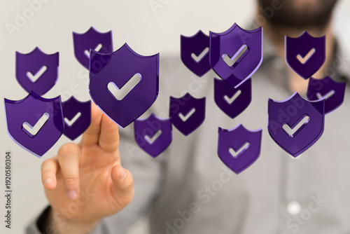 Hand pointing at shields wi...