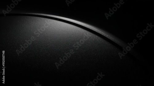 Vantablack texture, absolute darkness with a single faint rim light highlighting a curve, mysterious luxury