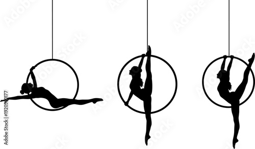 Beautiful black silhouettes of female acrobats performing elegant aerial hoop gymnastics routines isolated on a clean white background for design.
