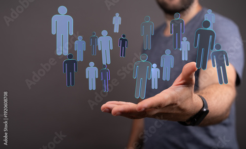 Man holding floating people...