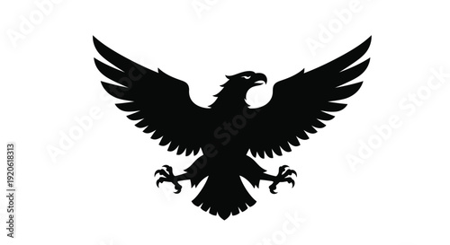 A striking black silhouette of an eagle with wings outstretched