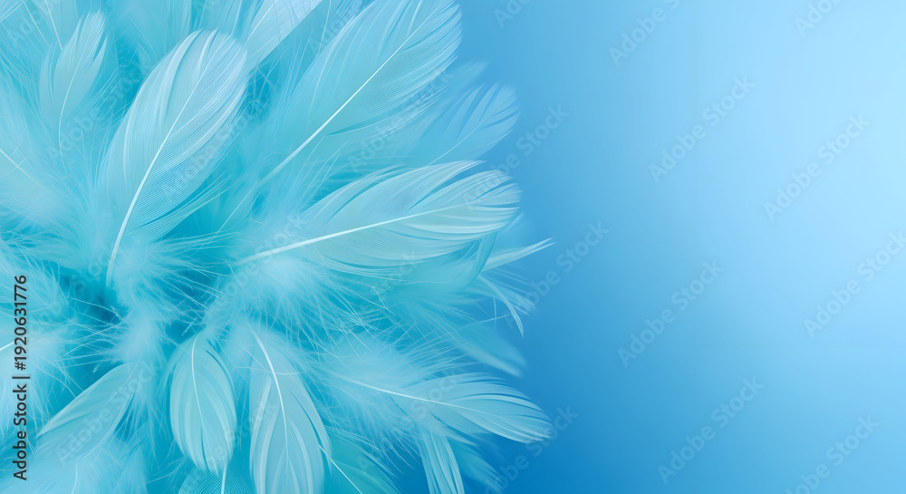 Fototapeta premium Happy easter Soft blue feathers arranged in a circular pattern against a gradient blue background light airy