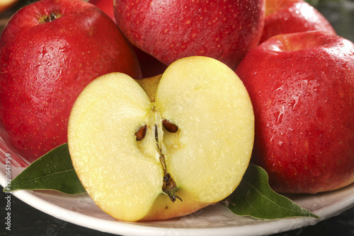 Canvas Print Fresh Red Fuji Apples with Sliced Heart Showing Pulp - Healthy Organic Fruit fro