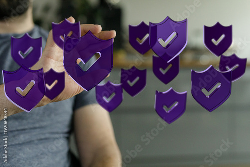 Hand holding digital shield...