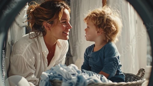 Mother Doing Laundry with Child Sitting in Basket