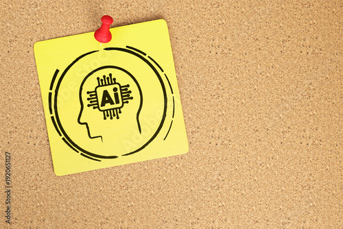 AI chip on sticky note pinned to cork board background