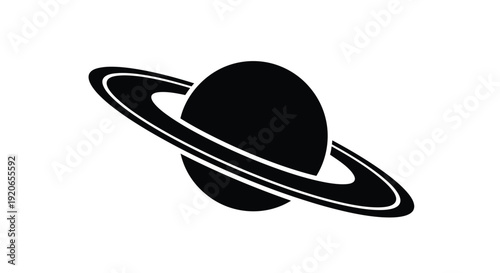 A striking black planet with rings a bold graphic silhouette