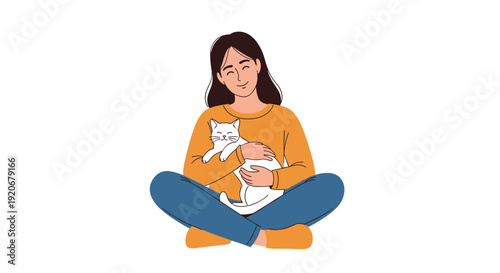 Happy young woman sitting cross legged on the floor while hugging a white kitten in her arms with a content expression.