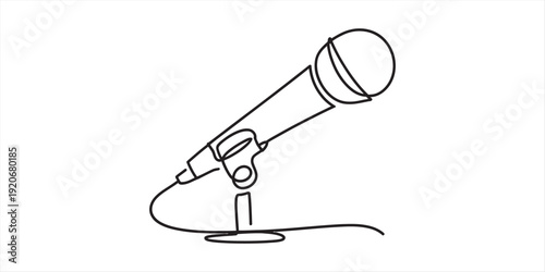 A simple black and white line drawing of a microphone on a small desk stand with a cord. Vector, illustration