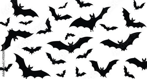 Black silhouette bats flying on white background