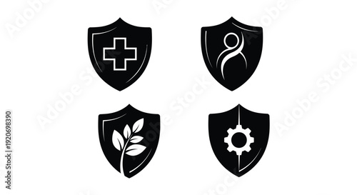 Four black shield icons with symbols a striking silhouette