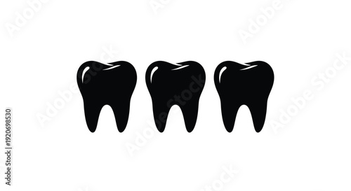 Four isolated teeth depicted in a striking black silhouette