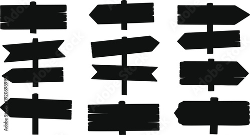 set of directional signpost silhouettes on a white background