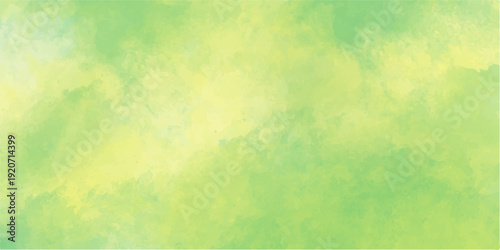 Vintage abstract watercolor background featuring a colorful grunge paint texture on aged yellow and green parchment paper with light artistic copy space
