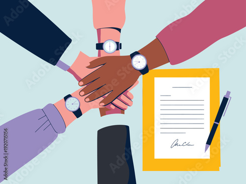 Diverse group of hands interlocking in a show of unity, with a contract and pen nearby, symbolizing teamwork and agreement.