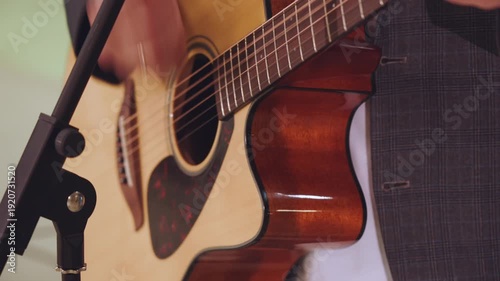 Guitar player, guitar playing process, guitar performance, guitar playing close-up