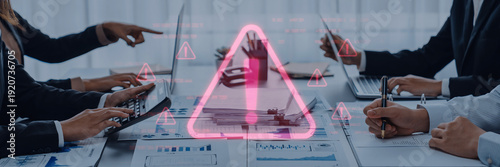 Konstfotografi A business team engages in a discussion about financial risk management, using data and visual indicators to make informed decisions in a modern office environment