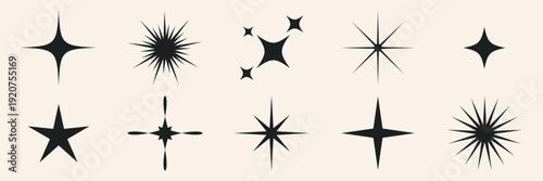 Sparkling stars icons. Set of twinkling stars with sparks.