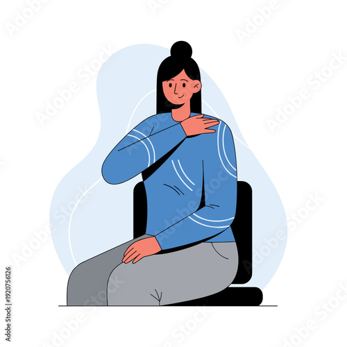 Young asian female sitting with hand on shoulder in blue sweater