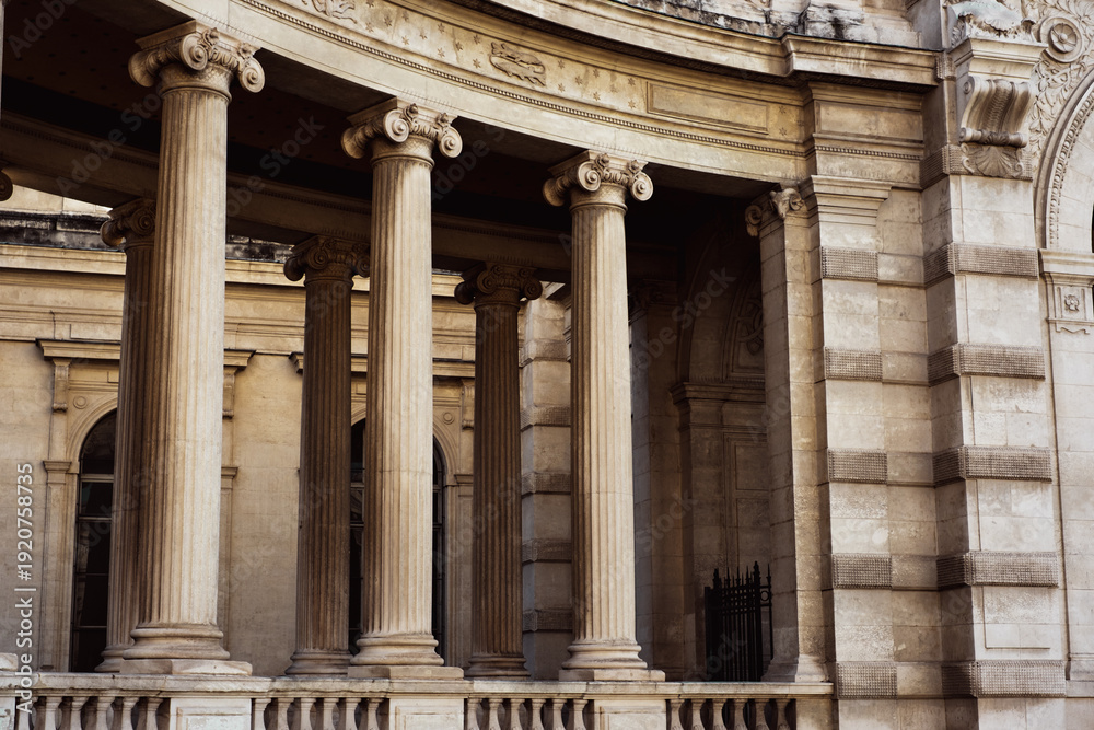 Obraz premium Historic architectural columns in classic stone building exterior design