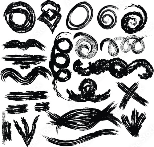 Collection of abstract black brush strokes and swirls on white background