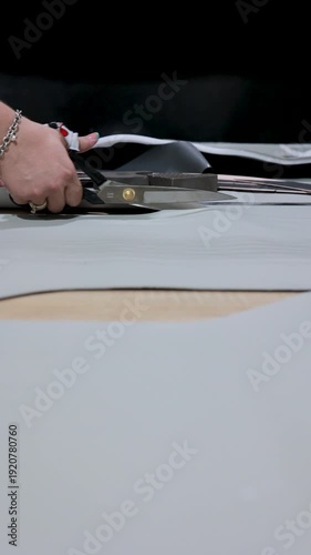 Cutting Upholstery Material with Large Scissors