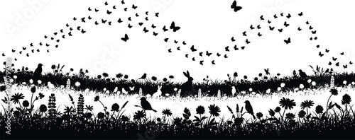 Large flock of birds flying over a field with tall grasses and plants in a natural landscape