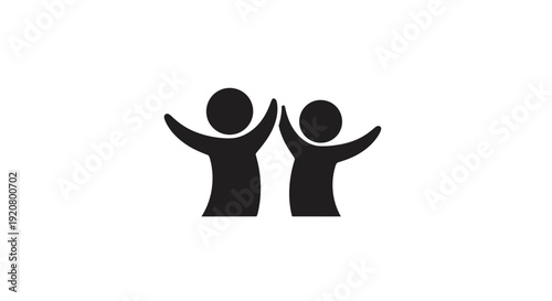 Two people high fiving each other.