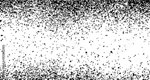 Black and white grunge texture with scattered ink particles creating a distressed, grainy effect. This abstract vector background features a dense concentration of dots at the top and bottom
