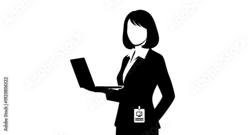 Businesswoman holding a laptop computer.