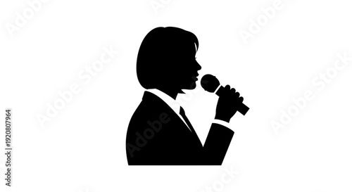 Silhouette of man speaking into microphone.