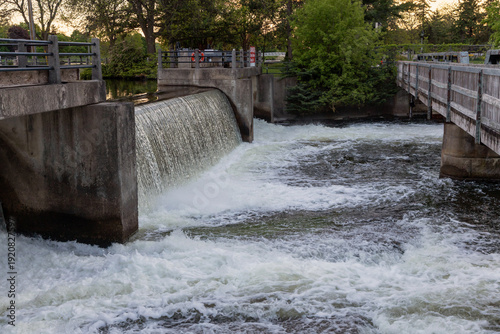 Water cascading over concrete dam in Smiths Falls, Canada