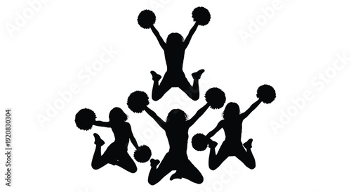 Cheerleaders in a dynamic pyramid pose a striking silhouette